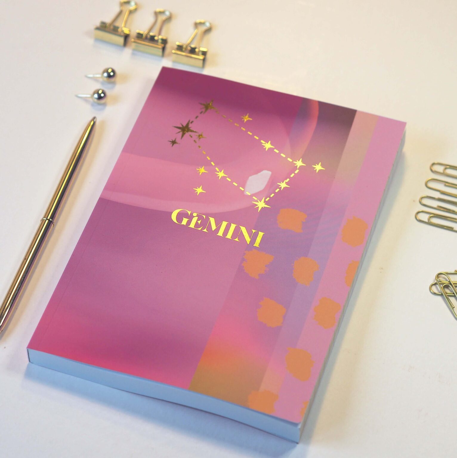 gemini zodiac notebook, lined journal style pages, gold foil star detail