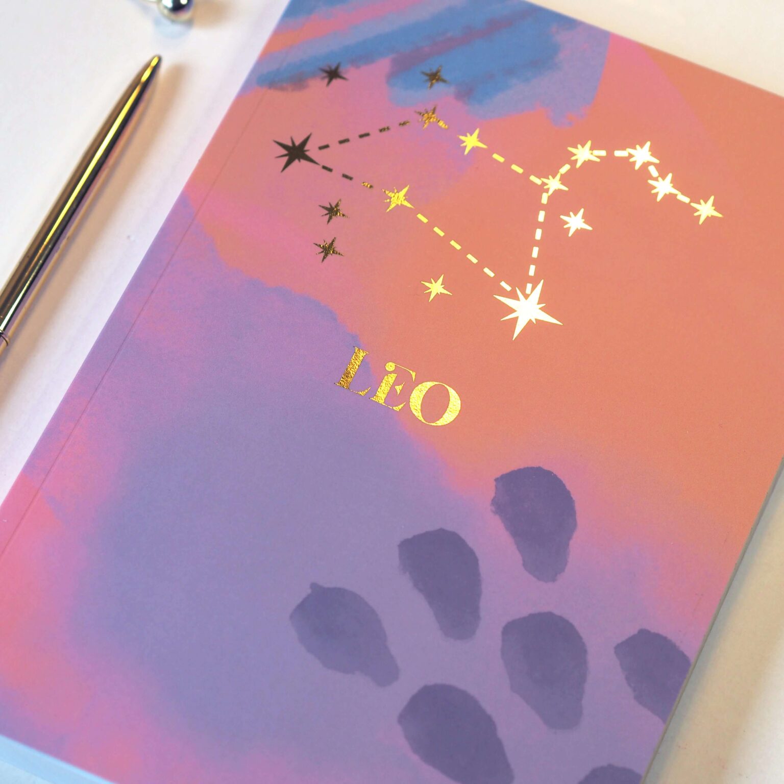 Leo zodiac notebook, lined journal style pages, gold foil star detail
